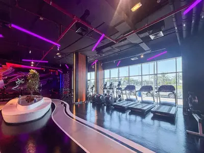 a gym with chairs and a christmas tree in the middle at Frank Porter - Al Jawhara Tower in Dubai