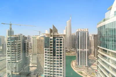 an aerial view of a city with tall buildings at Bright Studio in Dubai Gate 2 in Dubai