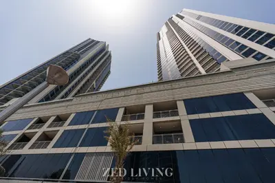 a view of the red living building at Emaar 5242 - Stunning Sea View Stay in Prime Waterfront Location - Zed Living in Dubai