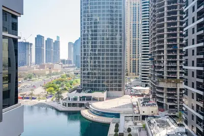 Gallery image of 1BR Gem with Lake and Sea View Plus Pool and Gym Access in Dubai
