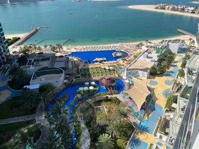 an aerial view of a resort with a beach at Oceana privat beach in Dubai