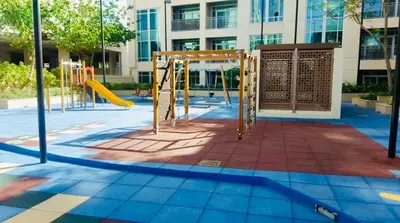 a playground with a slide in a building at & Burj Luxury Living 2bhk Direct Burj Khalifa View in Dubai