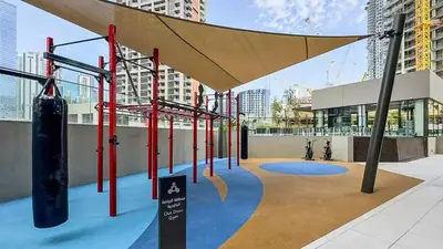 a play area on the roof of a building at TRPS - Peninsula Five, Business Bay - Stylish 1BR - Canal & Burj Khalifa Views in Dubai