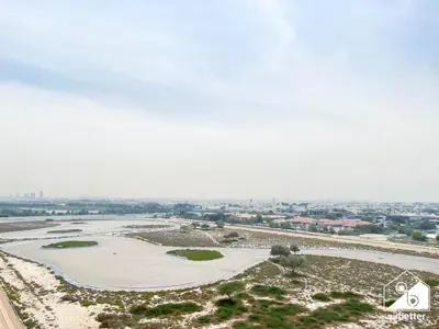 an aerial view of a river and a city at Stunning 2-Bedroom Apartment with Canal Views in Dubai