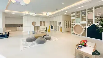 a large living room with a table and a table sidx sidx sidx at 2BR Next to Burj Khalifa& Dubai Mall in Grande Residence in Dubai