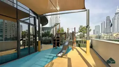 a playground on a building with a view of a city at 2BR Next to Burj Khalifa& Dubai Mall in Grande Residence in Dubai