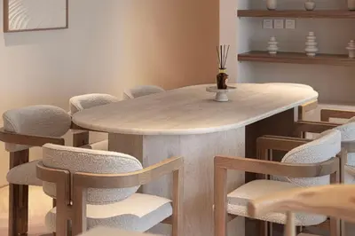 a dining room with a table and chairs at Seraya Residences at Marquise Square Tower in Dubai
