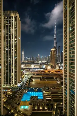 a view of a city skyline at night at Seraya Residence 3 - 4BDR - Burj Views - Amenities and Concierge in Dubai
