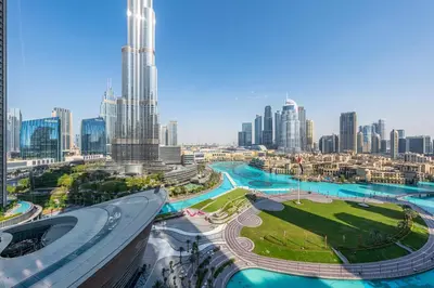 a view of a city with tall buildings at Full Burj Khalifa and Fountain View from All Rooms in Dubai