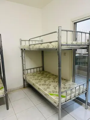 a couple of bunk beds in a room at hostel in Dubai