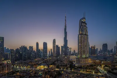 a skyline of a city with a tall skyscraper at Skyline Gem Full Burj View 2BR Suite with Dubai Mall access by Maxx Value homes in Dubai