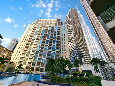 a view of a large building in a city at Stylish 1BR Apartment near Burj Khalifa and Dubai Fountain, Downtown in Dubai