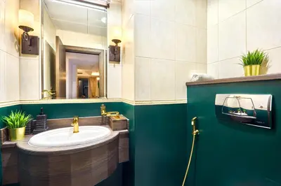 a bathroom with a sink and a mirror at Zen Den - Vintage Charm with full Sea View in Dubai