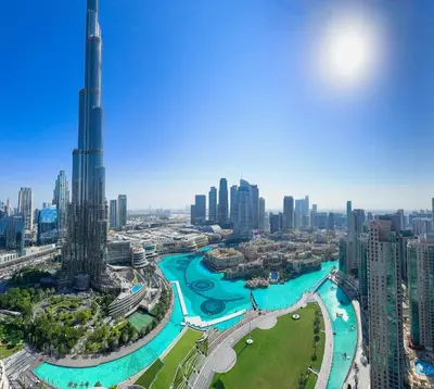 a view of the dubai skyline with the worlds tallest building at GRANDE SIGNATURE with a direct Burj Khalifa view and Private Fountain Show at high floor with DXB AIRPORT VIP Shuttle option for 6 guests in Dubai