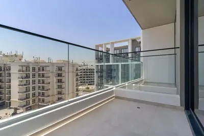 an empty balcony with a view of a city at Chic Studio in Arjan with Gym Pool Free parking in Dubai