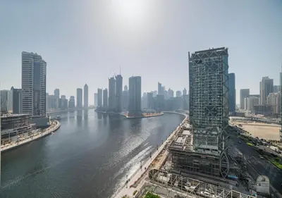a view of a river in a city with buildings at Stunning Canal View with Balcony in Dubai