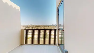 an open door to a balcony with a view at Elegant - Three Bed Villa in Jumeirah Golf Estate in Dubai