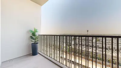 a balcony with a view of a city at Mag Eye 920 - Spacious Studio in Meydan in Dubai