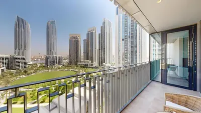a balcony with a view of the city at Creek Gate - Spacious Two Bed in Creek Harbour in Dubai
