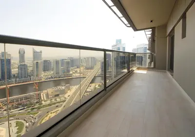a balcony in a building with a view of a city at 2BR Chic Elite Suite in Downtown near Dubai Mall in Dubai