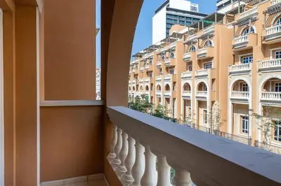 a balcony with a view of a building at Retro House in Dubai