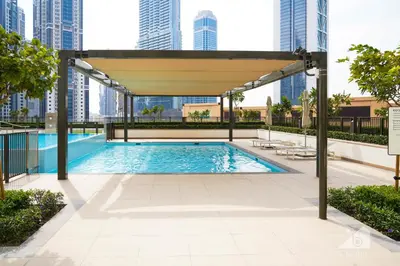 a swimming pool under a canopy in a city at Burj Crown Luxurious 2Bedroom Balcony in Dubai