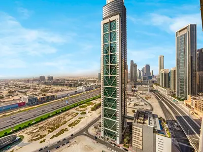 a rendering of a tall building in a city at Spectacular Burj View from Infinity Pool in Dubai