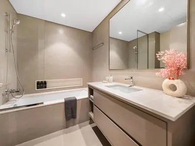 a bathroom with a sink and a bath tub at Grande Signature Residence 907 Full Burj Khalifa and Dubai Dancing Fountain View 5 Min Walk Dubai Mall Luxury Downtown Apartment in Dubai