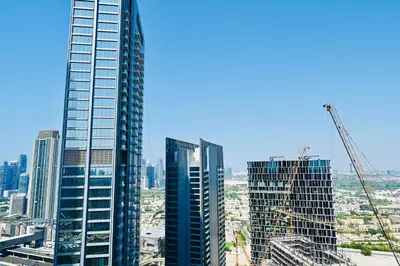 a view of a city skyline with tall buildings at Damac Maison Mall Street,Burj Khalifa in Dubai