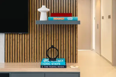 a book sitting on top of a table at Elegant 2BR Apartment near Burj Khalifa, Downtown Dubai in Dubai