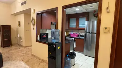 a kitchen with a blender in the middle of it at Marina View Luxury Retreat Modern Apartment JBR Dubai in Dubai