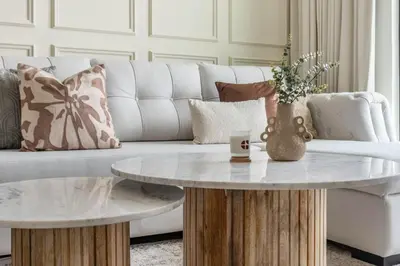 a living room with a couch and a coffee table at GuestReady - Stunning unit at Binghatti House in Dubai