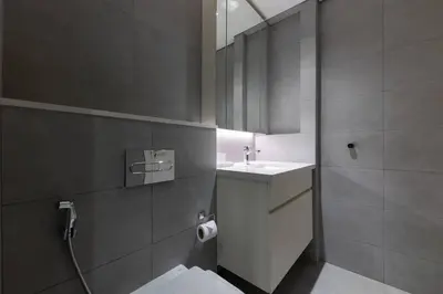 a bathroom with a toilet and a sink at Ahad Residences Skyline Studio in Business Bay in Dubai