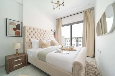 a bedroom with a large bed with a large window at Frank Porter - Vincitore Benessere 2 in Dubai