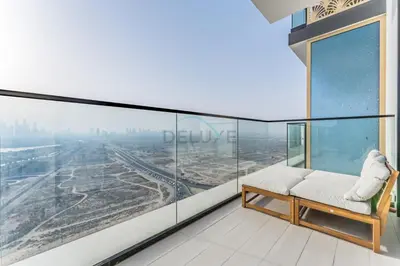 an apartment balcony with a view of a city at Newly Furnished Apartment near Circle Mall with Marina Views, Binghatti Onyx, JVC by Deluxe Holiday Homes in Dubai