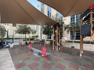 a playground with play equipment in a building at Modern 2BR in the heart of Downtown Dubai in Dubai