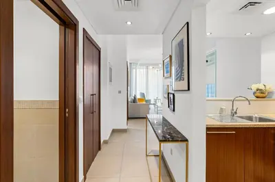 a kitchen with a sink and a counter top at Burj Vista - Prime Downtown Dubai in Dubai