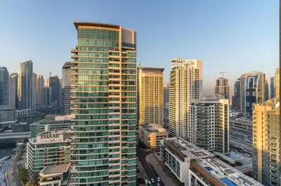 a view of a city with many tall buildings at Panoramic Marina 1BR City Skyline Views with Balcony, Pool & Gym Access in Dubai