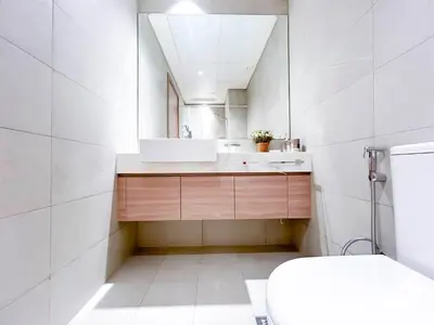 a bathroom with a sink and a mirror at Luxury Living in Azizi Riviera l Cozy Balcony in Dubai