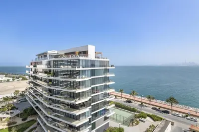 an aerial view of a large apartment building next to the ocean at VayK - Great Escape at Anantara The Palm Residences in Dubai