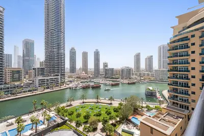 a view of a river in a city with buildings at VayK - Premium 2BR Stay in Dubai Marina in Dubai