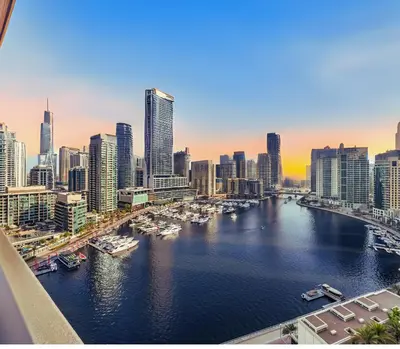 a view of a city with boats in the water at Premium One-Bedroom Apartment with Spectacular Marina View & Private Balcony by Dejaview Stays in Dubai