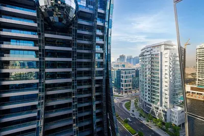 a view of a tall building in a city at Tranquil Haven Near Burj Khalifa in Dubai
