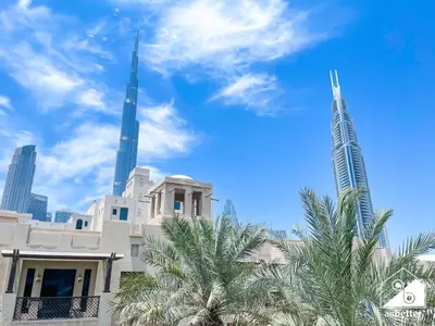 a view of the burj khalifa and the shahida synagogue at Burj Views from Balcony l Chic 2BR in Downtown in Dubai