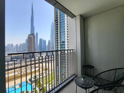 a balcony with a view of a city skyline at Downtown Views 2 - Burj Khalifa View in Dubai
