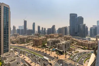 a view of a city with a highway and buildings at 2 Bedroom Apartment BLVD Central 1 with Boulevard Views in Dubai