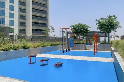 a playground in the middle of a pool at Burj Khalifa Views at Downtown Views II 3 Bedroom Apartment in Dubai
