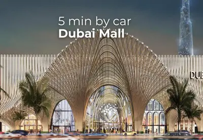 a large shopping mall with a large building at SettlerHomes - Private Jacuzzi Oasis on the High-Floor in Dubai