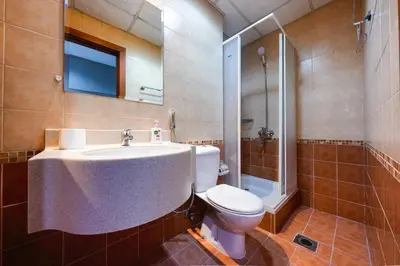 a bathroom with a toilet and a sink and a shower at Best View in Marina Dubai in Dubai