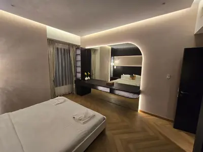 a hotel room with a bed and a mirror at Highend 2BR Skyline View with Beach JBR in Dubai